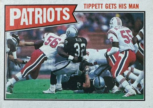 1987 Topps New England Patriots Tippett Gets His Man Football Card #96